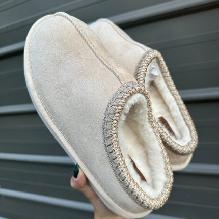 Cow print bruin slippers