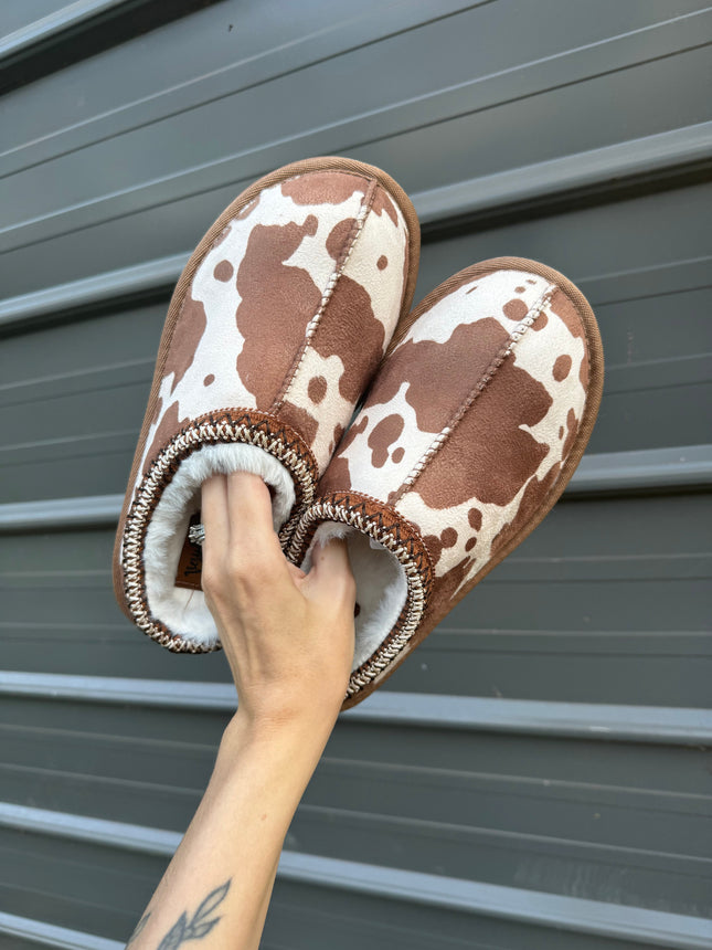 Cow print bruin slippers