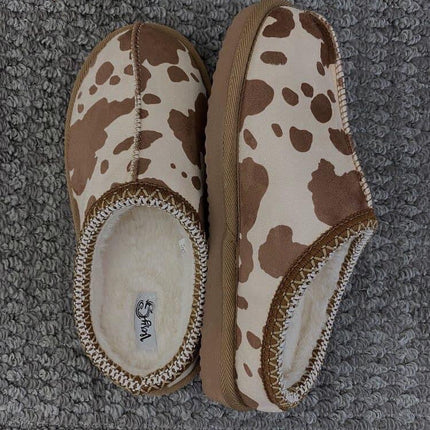 Cow print bruin slippers